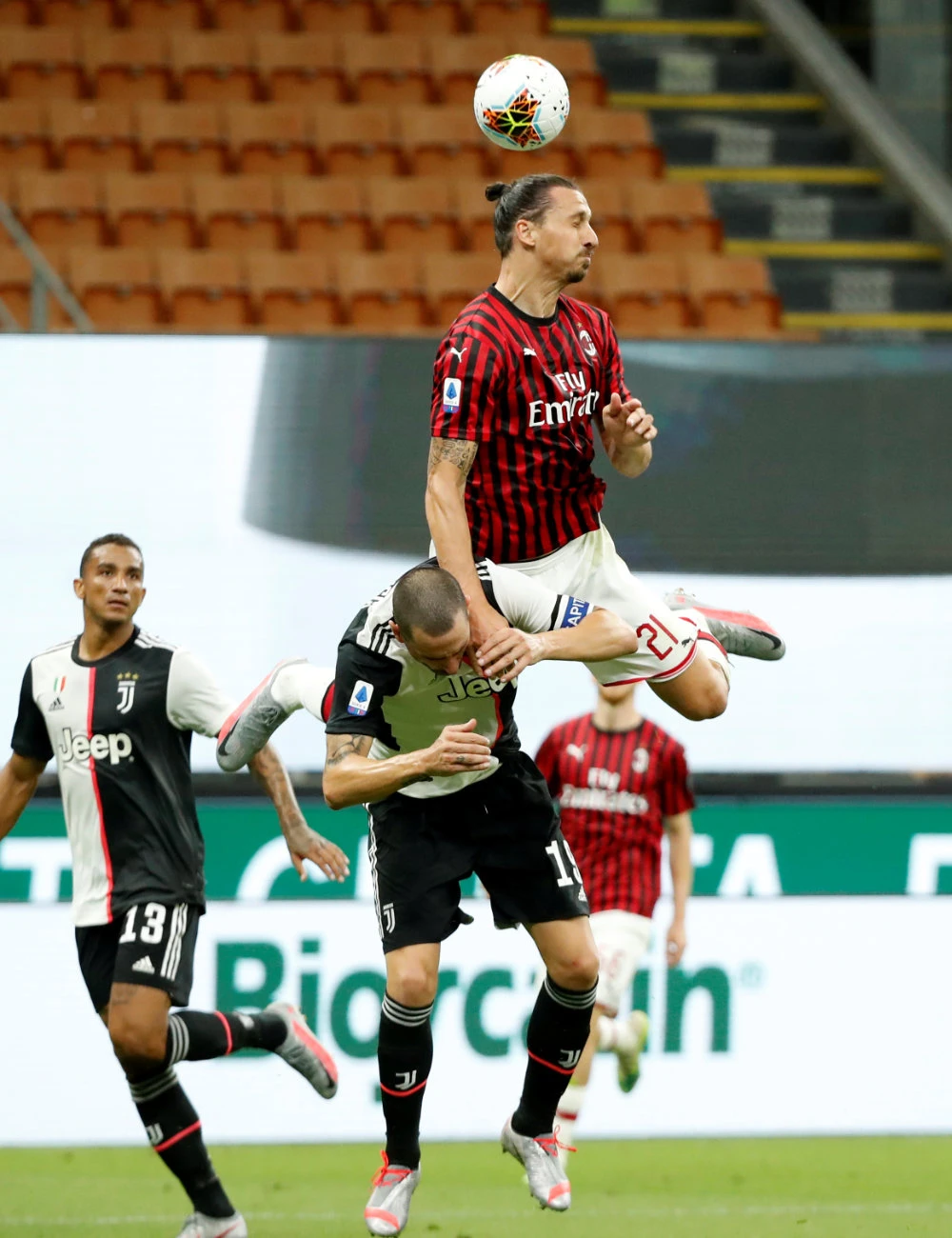AC Milan’s Zlatan Ibrahimovic (top) in action with Juventus’ Leonardo Bonucci during their Serie A football match. (Reuters)