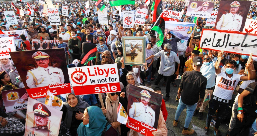 Military commander Khalifa Haftar’s backers in Libya’s eastern port city of Benghazi have time and again protested against Turkey’s interference in the country. (AFP)