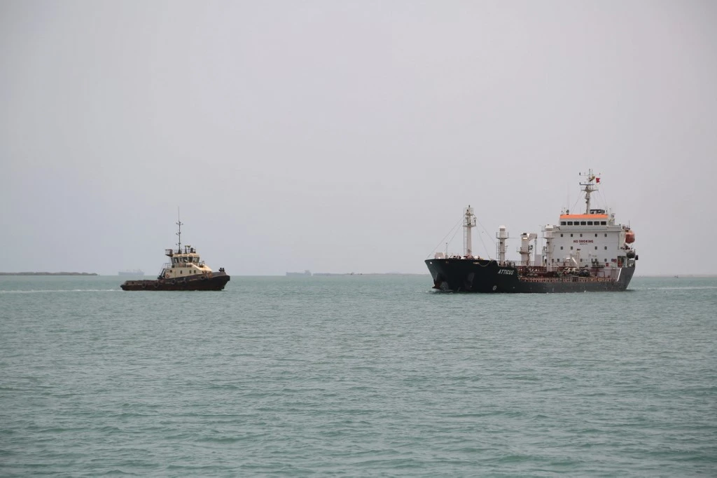 Ships are seen at Saleef port in the western Red Sea Hodeida province, on May 13, 2019. (File/AFP)