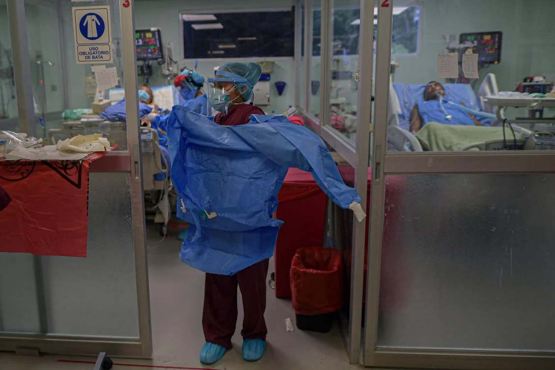 A nurse wears her protective suit at the Intensive Care Unit of the Dr. Arnulfo Arias Madrid Hospital Complex, in Panama City on July 04, 2020. Panama is the country with the highest rate of COVID-19 cases in Central America and the Caribbean. (AFP)