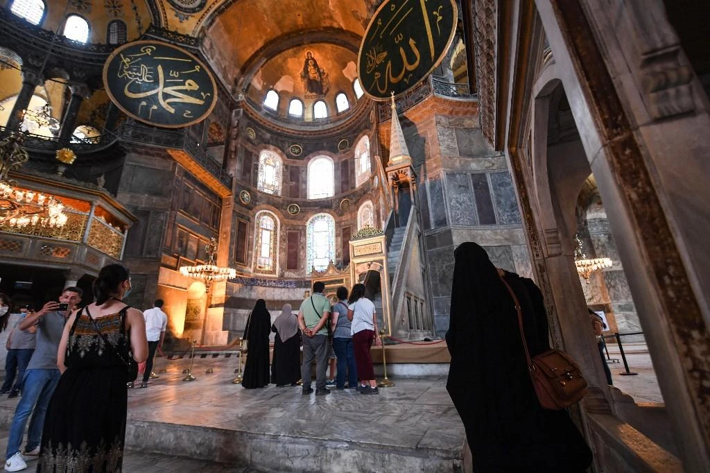 President Recep Tayyip Erdogan that Muslim prayers would begin on July 24 at Hagia Sophia. Above, visitors inside the UNESCO World Heritage site. (AFP)
