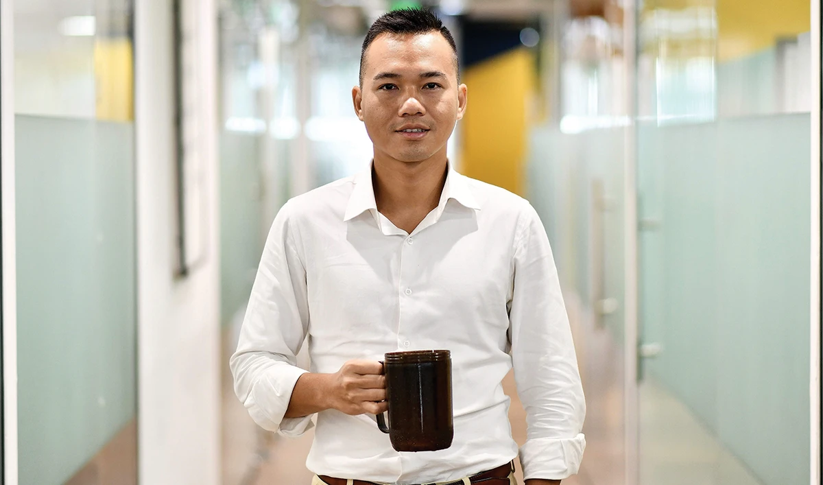 Entrepreneur Le Thanh, managing director of ShoeX, at his co-working space in Ho Chi Minh City. (AFP)