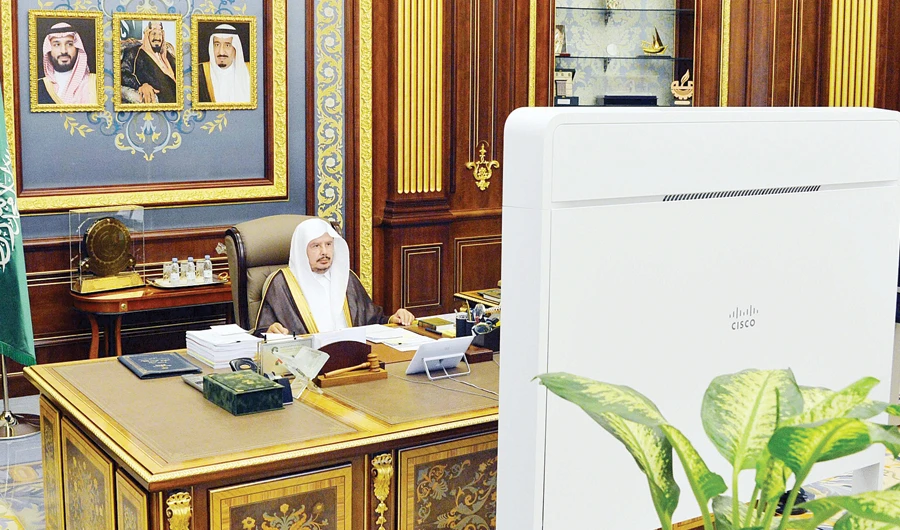 Saudi Shoura Council Speaker Dr. Abdullah Al-Asheikh chairs a session of the council via videoconferencing in Riyadh on Monday. (SPA)