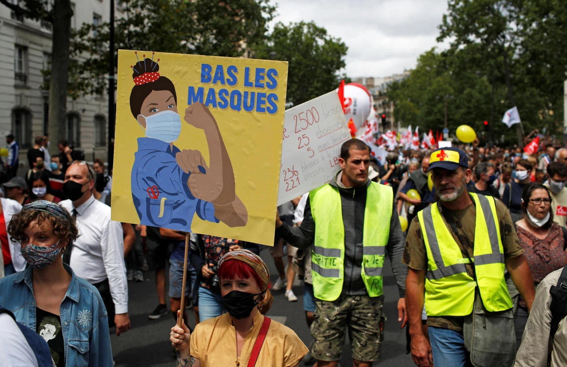 France says ‘merci’ to virus heroes on poignant Bastille Day