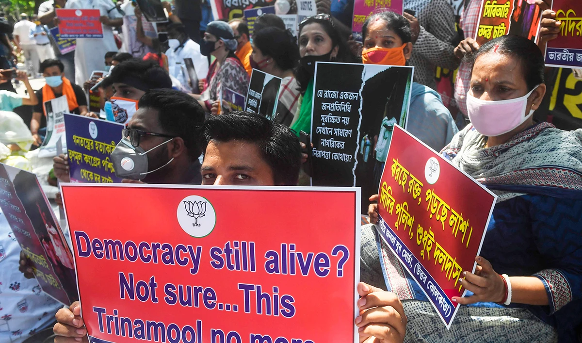 Bharatiya Janata Party activists hold a protest in Kolkata on Wednesday against the West Bengal state government, demanding a CBI (Central Bureau of Investigation) probe into the death of BJP leader Debendra Nath Roy. (AFP)