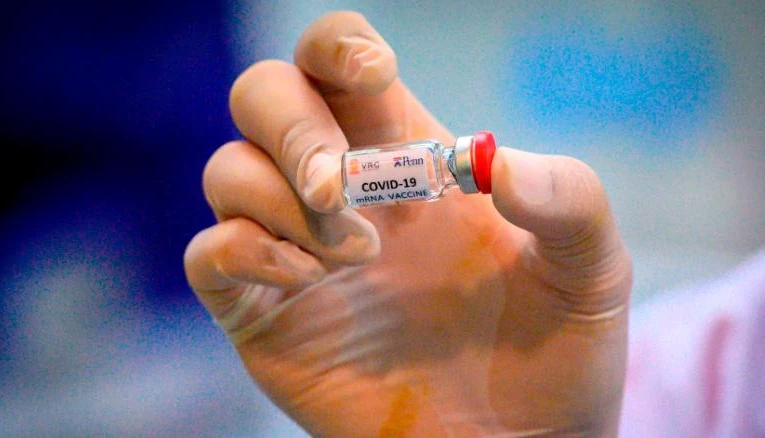 The trials, run by teams at Oxford University in the UK and pharmaceutical company Moderna in the US, have both received significant government funding in their bids to develop their vaccines before the end of the year. (AFP)