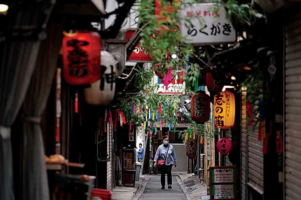 The rise in coronavirus cases in the capital Tokyo has raised questions about the planned tourism campaign. (AP)