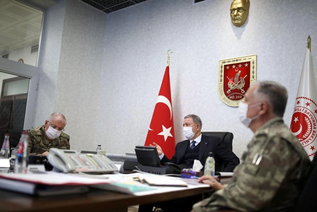 The Turkish Minister of Defense Hulusi Akar (C) and the Turkish Armed Forces Command meeting on June 17. (File/AFP)