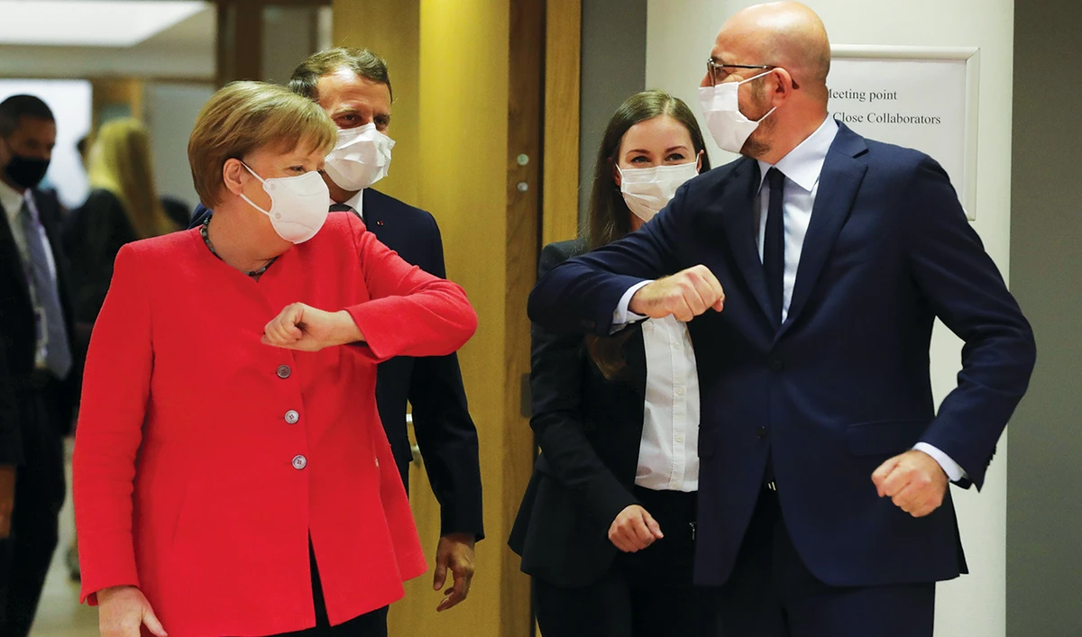 Germany’s Chancellor Angela Merkel, French President Emmanuel Macron, Finland’s Prime Minister Sanna Marin and European Council President Charles Michel at the start of the first face-to-face EU summit since the coronavirus outbreak, in Brussels, Belgium. (Reuters)