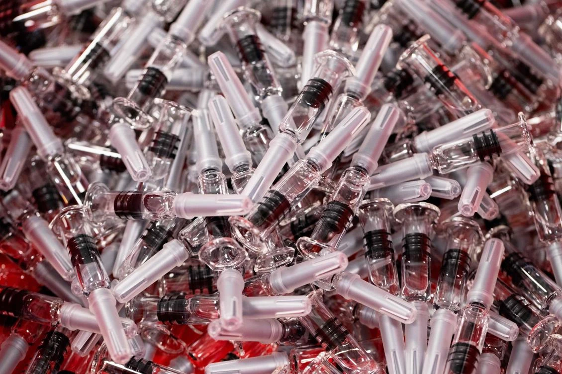 Intelligence agencies in the US, Britain and Canada accused the hacking group APT29, believed to be part of Russian intelligence, of using malicious software to attack institutions involved in COVID-19 vaccine development. (AFP)