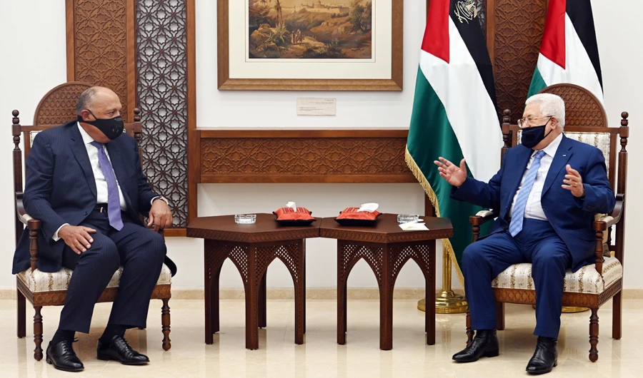 Palestinian President Mahmoud Abbas meets with Egyptian Foreign Minister Sameh Shoukry in Ramallah in the Israeli-occupied West Bank July 20, 2020. (REUTERS)