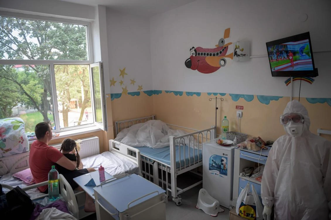 A medic visits patients infected with COVID-19 at "Victor Babes" infectious diseases hospital in Timisoara city on July 18, 2020. (AFP)