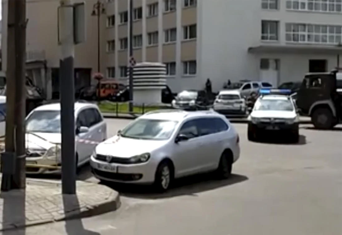 In this image take from video, the scene as police close off the streets, after an armed man seized a bus and took some 20 people hostage in the city centre of Lutsk, some 400 kilometers (250 miles) west of Kyiv, Ukraine on Tuesday July 21, 2020. (AP)