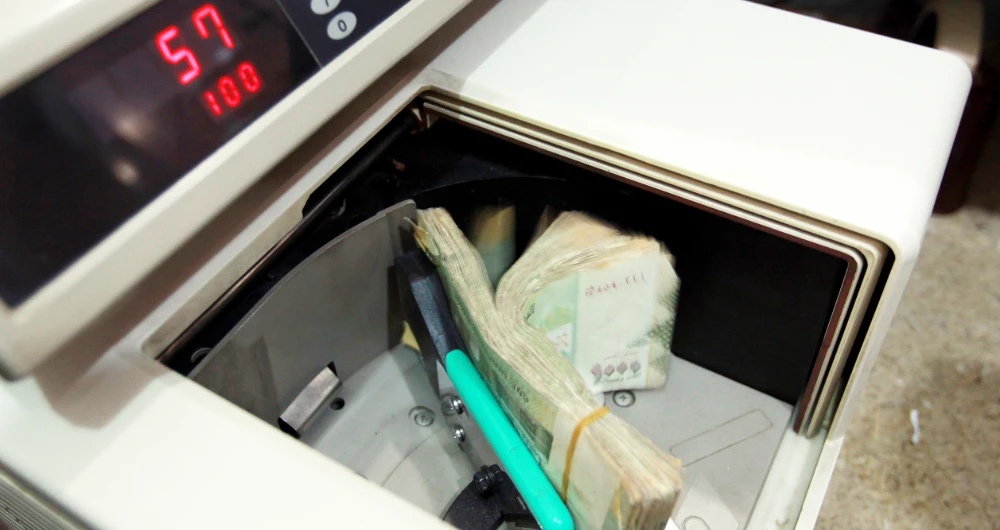 The impact of the currency depreciation on the Yemeni economy and the public is dramatic, experts and economists said. (AFP)