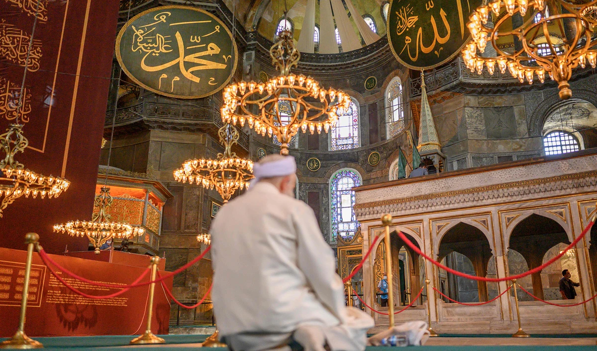 A worshipper prays during the first Muslim prayers in Hagia Sophia, in Istanbul, on July 24, 2020, since the controversial reconversion of the iconic Istanbul cathedral into a mosque. (AFP)