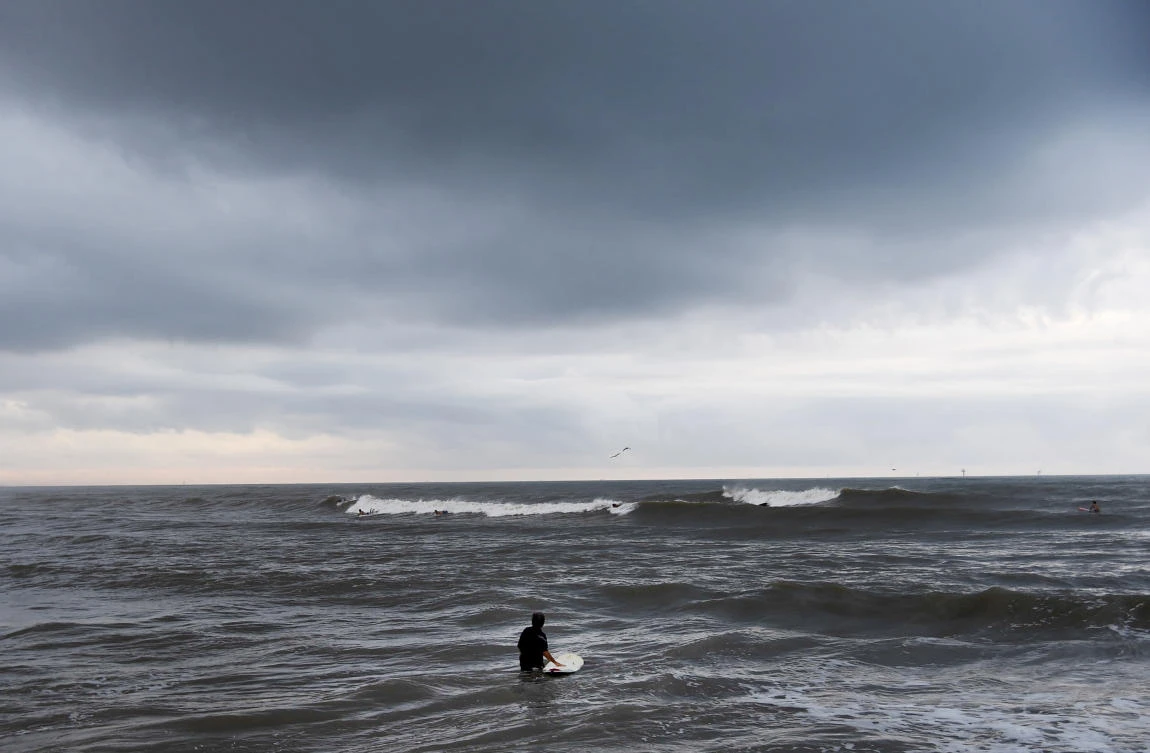 Dark clouds are seen over the ocean at J.P. Luby Park ahead of Tropical Storm Hanna, Friday, July 24, 2020, in Corpus Christi, Texas. The storm is expected to make landfall on Saturday. (AP)
