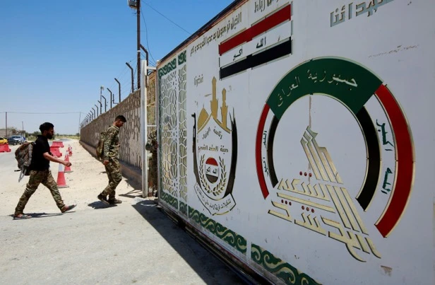 Explosion hits southern Baghdad weapons depot, blamed on heat