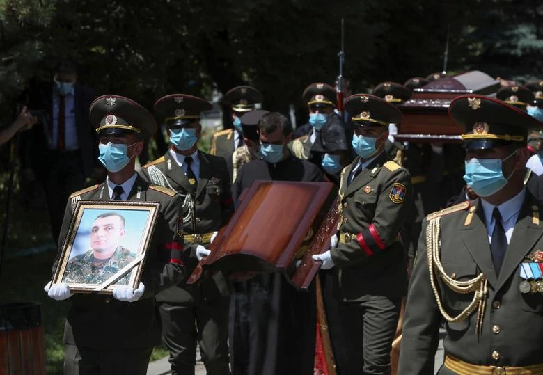 Mourners attend the funeral of Major Garush Hambardzumyan, who was killed in recent border clashes between the armed forces of Armenia and Azerbaijan, in Yerevan, Armenia, July 16. (Reuters)
