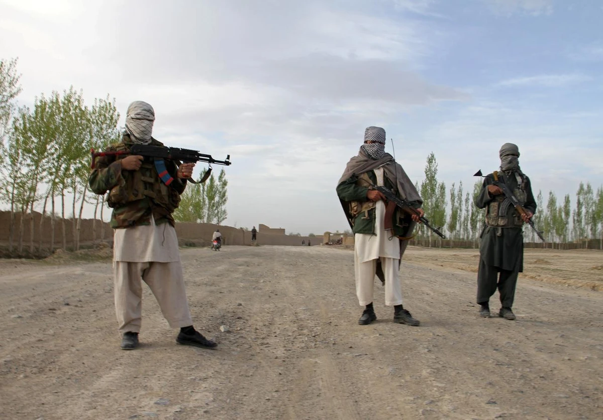 Members of the Taliban stand at the site of the execution of three men in Ghazni province, Afghanistan. (Reuters/File Photo)