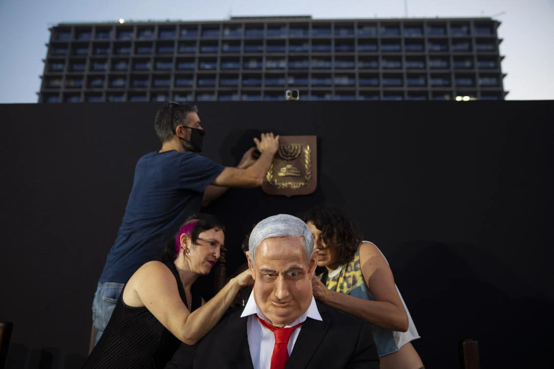 The installation, placed in a central Tel Aviv square on Wednesday, in the latest twist in a summer of protests against Netanyahu and his lengthy rule. (AP)