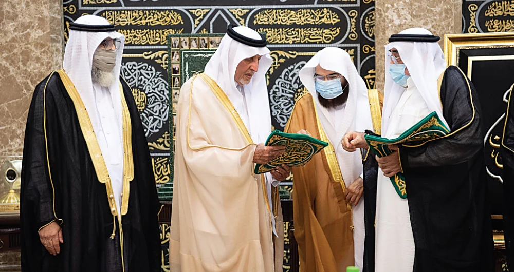 Makkah Gov. Prince Khalid Al-Faisal handing over the Kiswa. (Supplied)