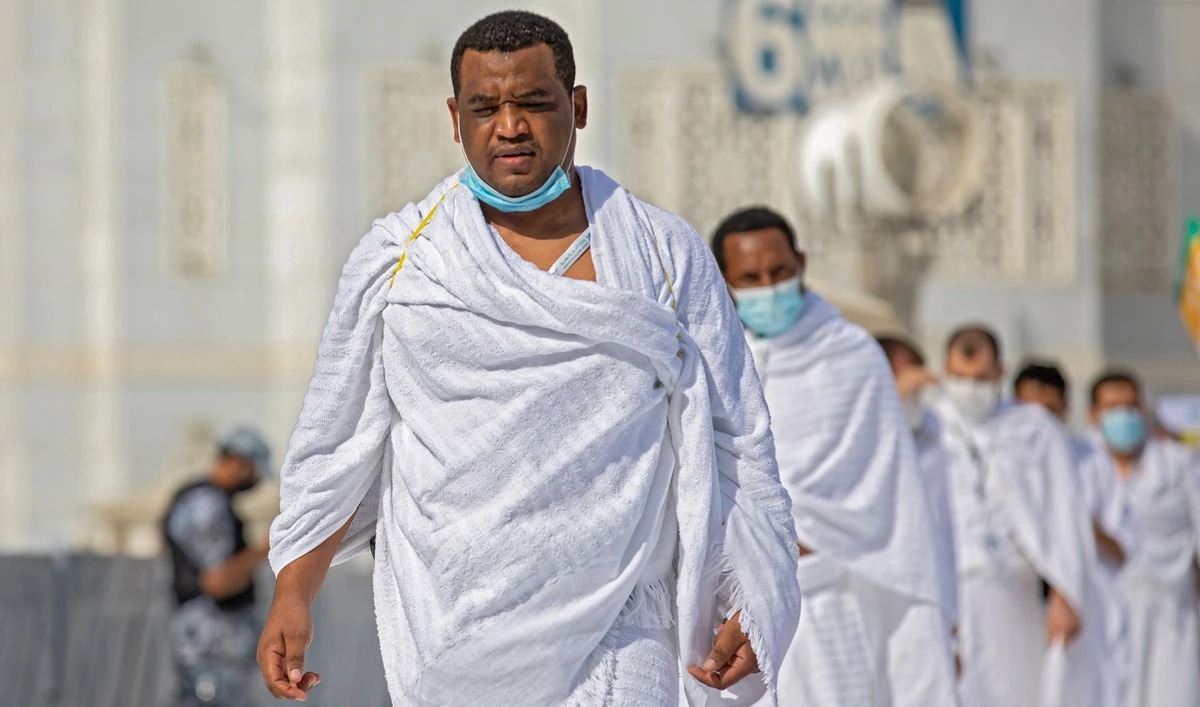 A hadnout picture released by the Saudi ministry of media shows a small number of pilgrims circumambulating around the Kaaba (not seen in picture) at the center of the Grand Mosque in Makkah at the start of the annual Muslim Hajj pilgrimage on July 29, 2020. (Saudi Ministry Of Media via AFP)