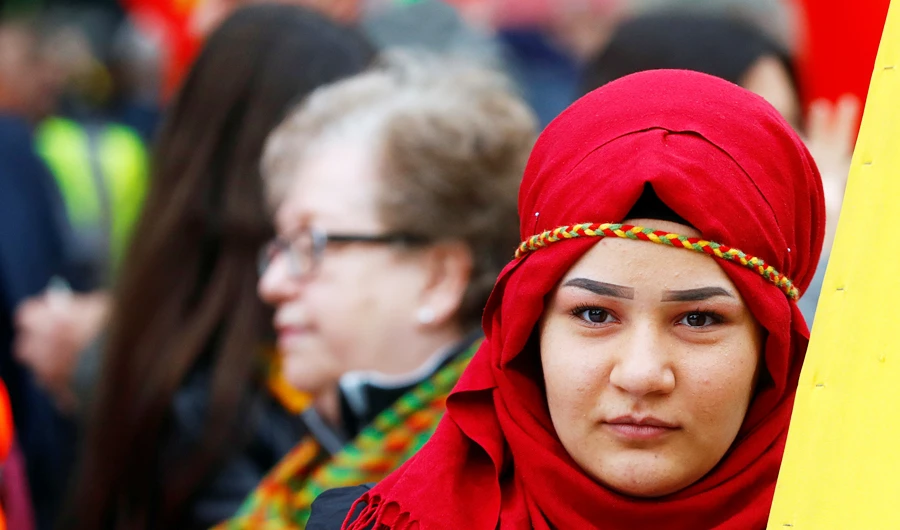 Pro-Kurdish demonstrators protest against Turkey's military action in northeastern Syria in Berlin, Germany, October 19, 2019. (REUTERS)
