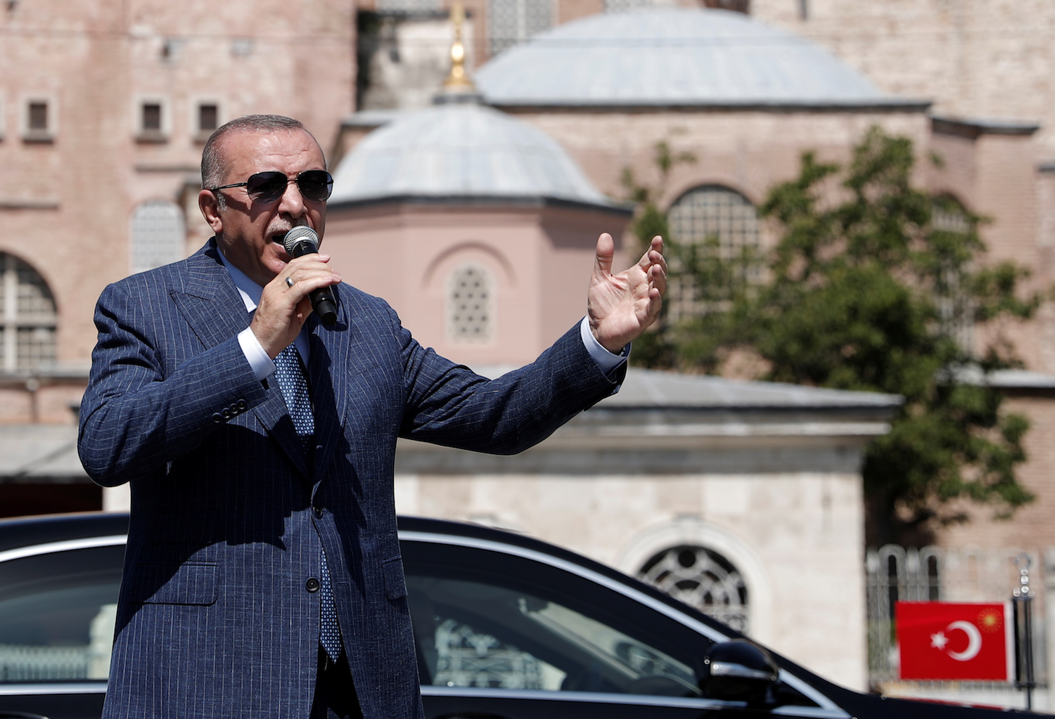 Turkish President Tayyip Erdogan talks to the media after attending Friday prayers at Hagia Sophia Grand Mosque in Istanbul, Turkey August 7, 2020. (Reuters)