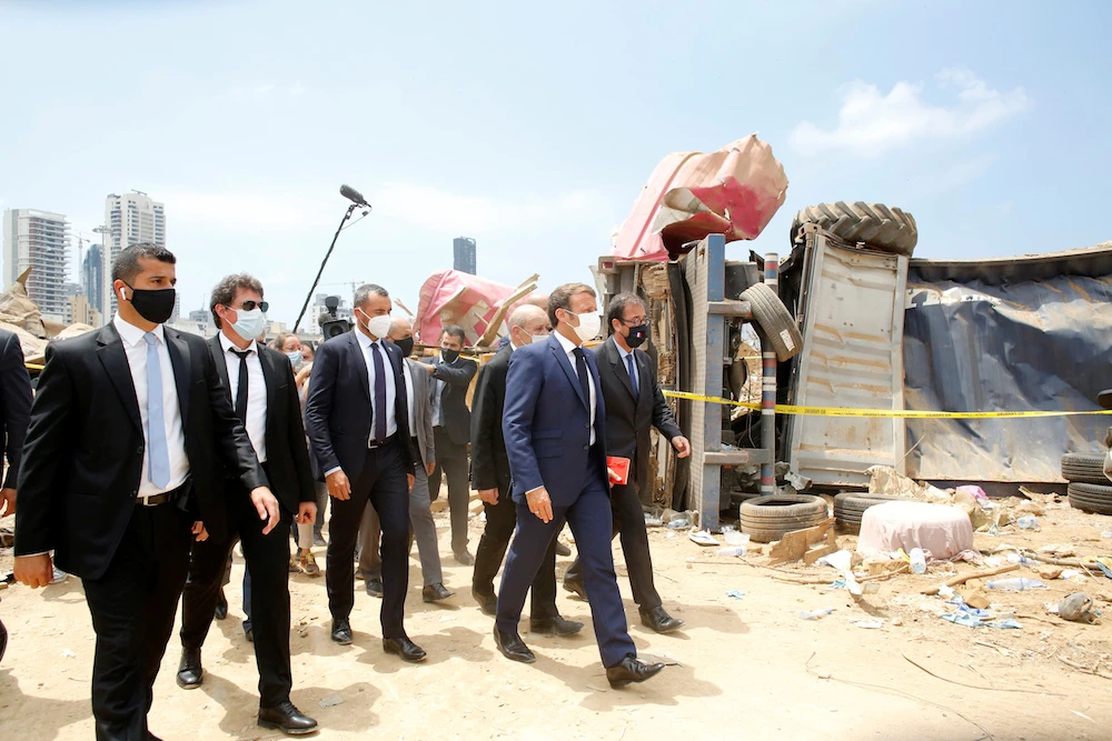 French President Emmanuel Macron visits the devastated site of the explosion at the port of Beirut, Lebanon August 6, 2020. (Reuters)