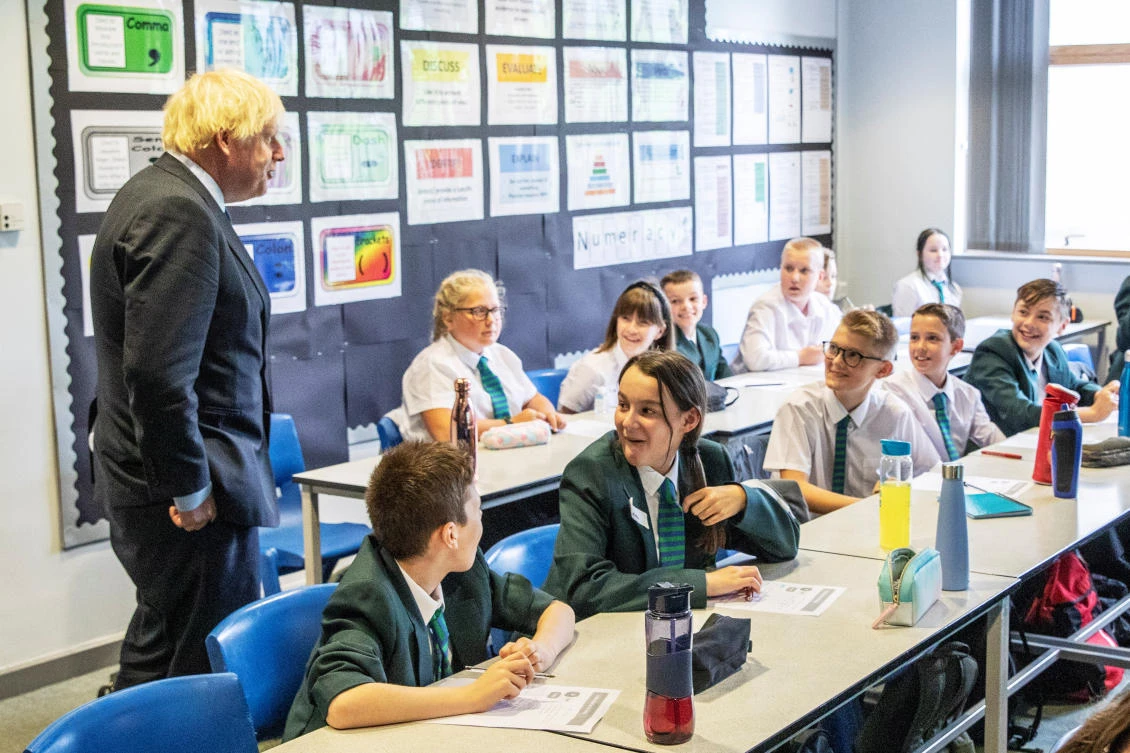 Britain's Prime Minister Boris Johnson visits Castle Rock school on the pupil's first day back to school, in Coalville, Britain August 26, 2020. Jack Hill/Pool via REUTERS