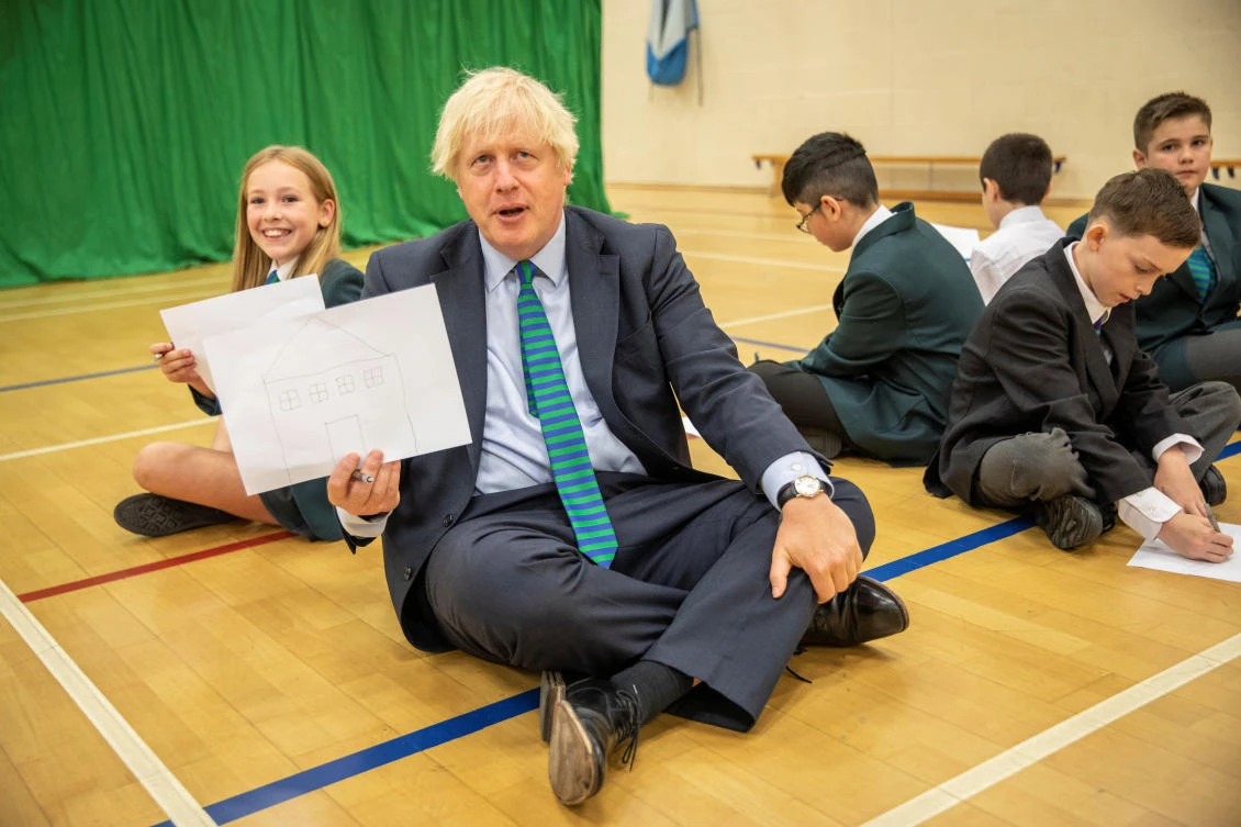 Britain's Prime Minister Boris Johnson visits Castle Rock school as he takes part in a getting to know you induction session on the pupil's first day back to school, in Coalville, Britain August 26, 2020. Jack Hill/Pool via REUTERS