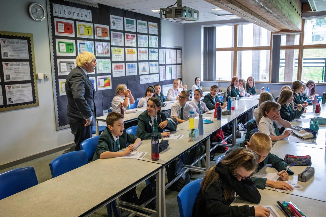 Britain's Prime Minister Boris Johnson visits Castle Rock school on the pupil's first day back to school, in Coalville, Britain August 26, 2020. Jack Hill/Pool via REUTERS