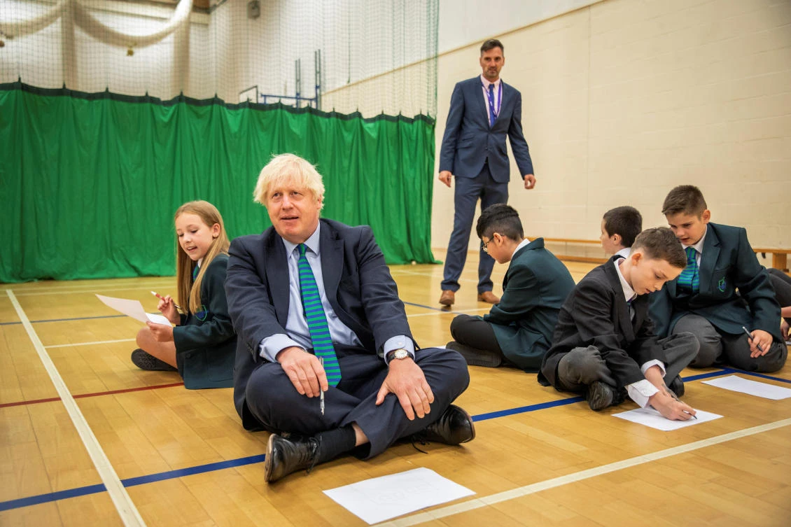 Britain's Prime Minister Boris Johnson visits Castle Rock school as he takes part in a getting to know you induction session on the pupil's first day back to school, in Coalville, Britain August 26, 2020. Jack Hill/Pool via REUTERS