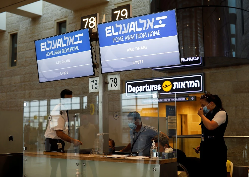 Screens display the flight number of Israeli flag carrier El Al which will carry Israeli and US delegations to Abu Dhabi at Ben Gurion Airport, near Tel Aviv on August 31, 2020. (Reuters)