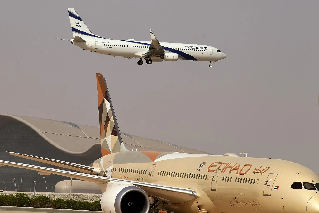 A picture taken on August 31, 2020, shows the El Al's airliner, which is carrying a US-Israeli delegation to the UAE following a normalisation accord, landing on the tarmac in the first-ever commercial flight from Israel to the UAE at the Abu Dhabi airport. A US-Israeli delegation including White House advisor Jared Kushner took off on a historic first direct commercial flight from Tel Aviv to Abu Dhabi to mark the normalisation of ties between the Jewish state and the UAE. (AFP/Karim Sahib)