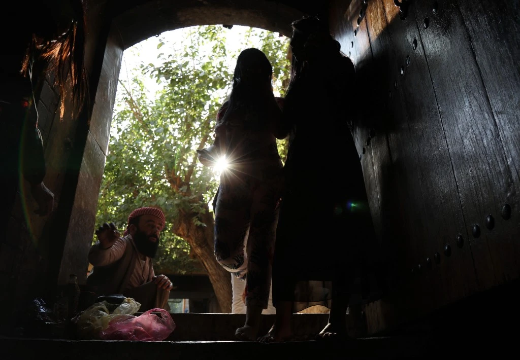 Above, Iraqi Yazidis visit the Temple of Lalish in a valley near the Kurdish city of Dohuk on August 2, 2019. (AFP)