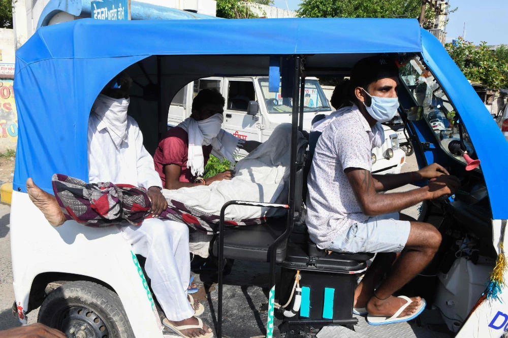 Indian police make arrests after tainted alcohol kills 69