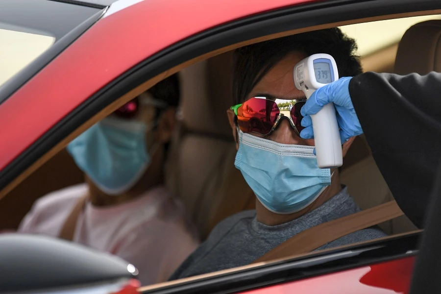 The UAE recorded 360 new recovered cases, bringing the total number of patients declared free from the virus to 54,615. (File/AFP)