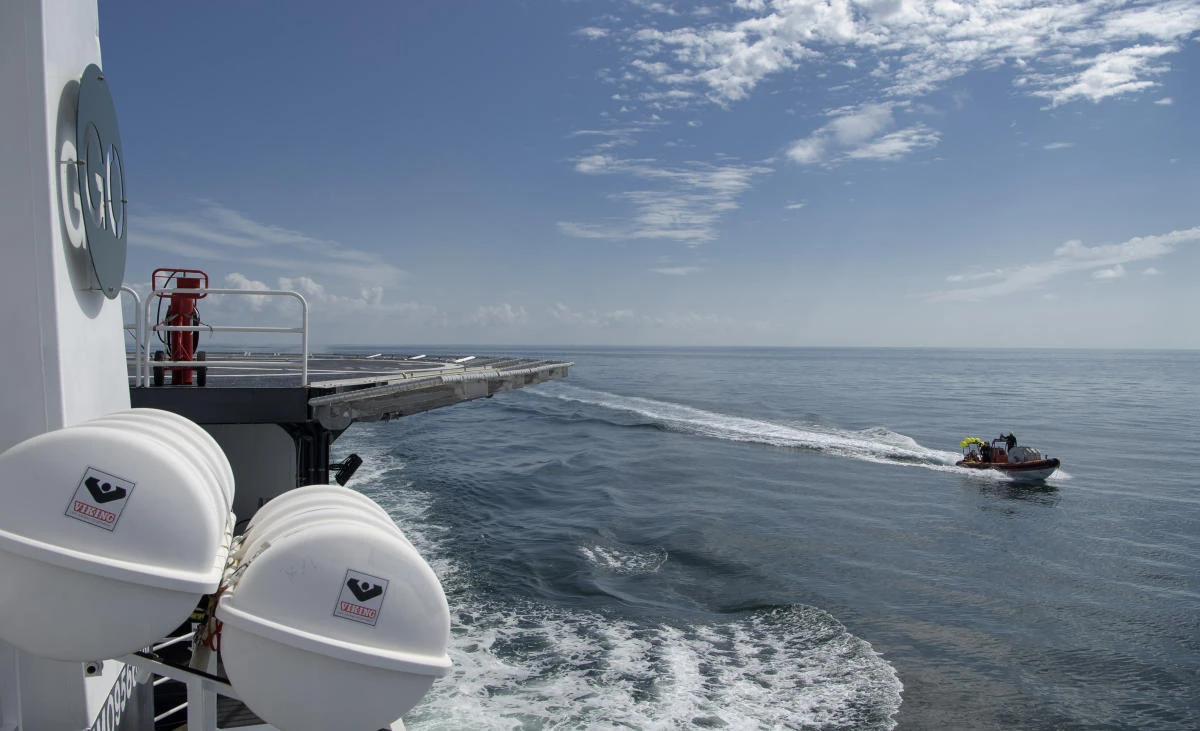 SpaceX support teams are deployed on fast boats from the SpaceX GO Navigator recovery ship ahead of the landing of the SpaceX Crew Dragon Endeavour spacecraft with NASA astronauts Robert Behnken and Douglas Hurley onboard, Sunday, Aug. 2, 2020, in the Gulf of Mexico off the coast of Pensacola, Fla. (Bill Ingalls/NASA via AP)