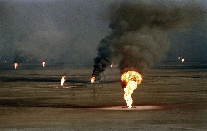 An aerial view of burning oil wells in al-Ahmadi oil field in Kuwait, set ablaze by retreating Iraqi troops, on March 14, 1991. (AFP file photo)