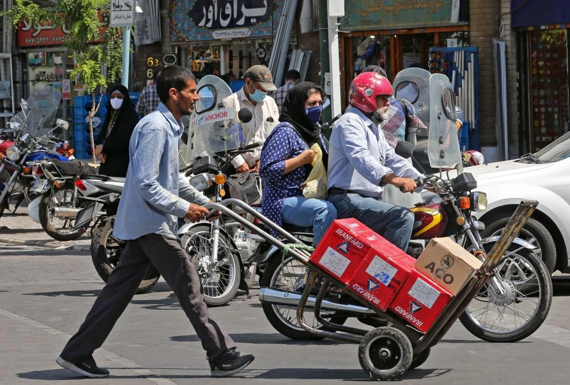 Iran’s deputy health minister called for those who fail to obey the mask rules to be fined. (AFP)