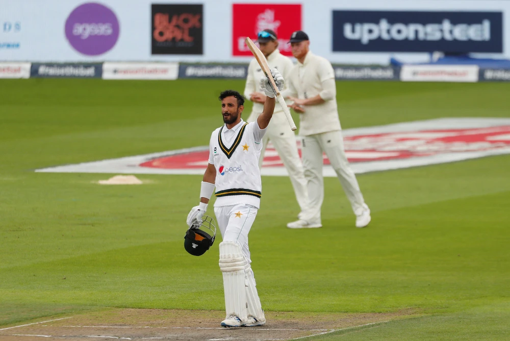 Pakistan's Shan Masood celebrates his century during the first Test at Manchester, as play resumes behind closed doors following the outbreak of the coronavirus disease (COVID-19). (Reuters)