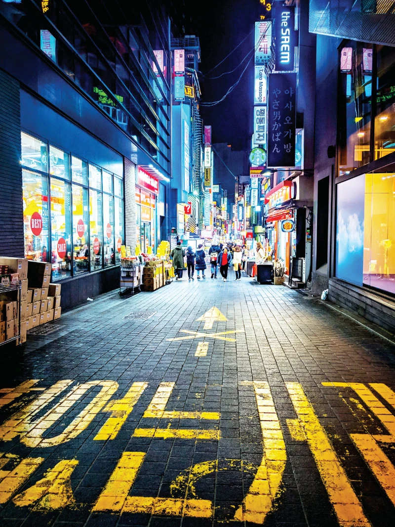 Shoppers in Seoul’s busy Myeongdong district. South Korea’s government has been accused of ignoring concerns over housing affordability. (Shutterstock)