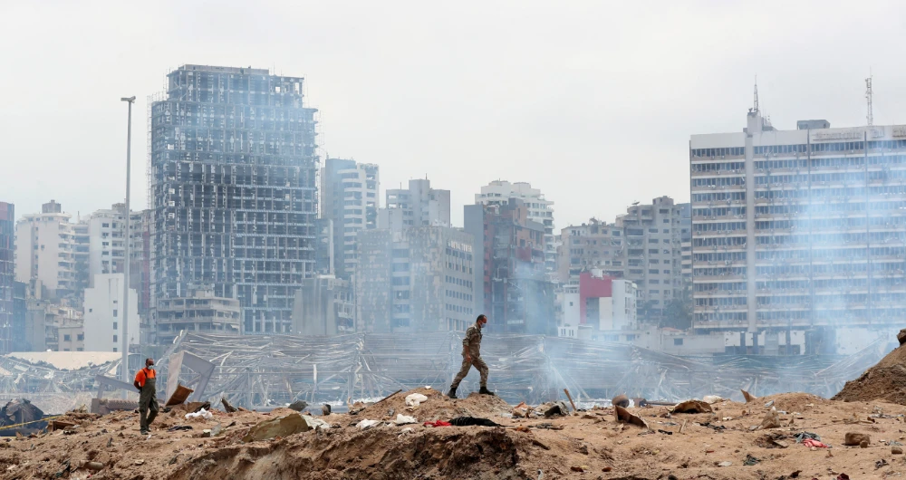 Warehouses storing medicines and vaccines in the port of Beirut were damaged in Tuesday’s monster blast. (AFP)