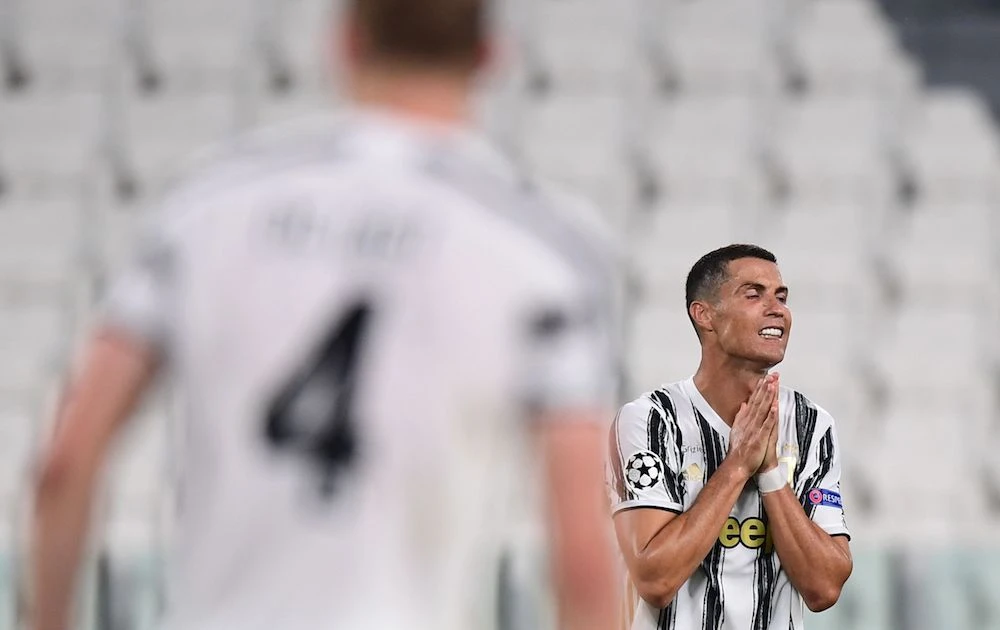 Juventus' Portuguese forward Cristiano Ronaldo reacts during the UEFA Champions League round of 16 second leg football match between Juventus and Olympique Lyonnais. (AFP)