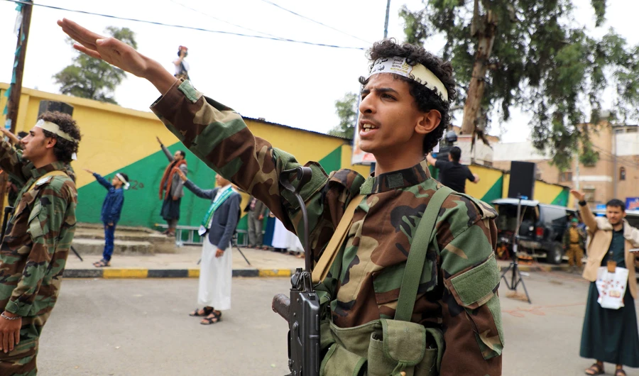 Security forces loyal to Yemen's Shiite Huthi rebels perform a salute during a gathering in Sanaa on August 8, 2020. (AFP)