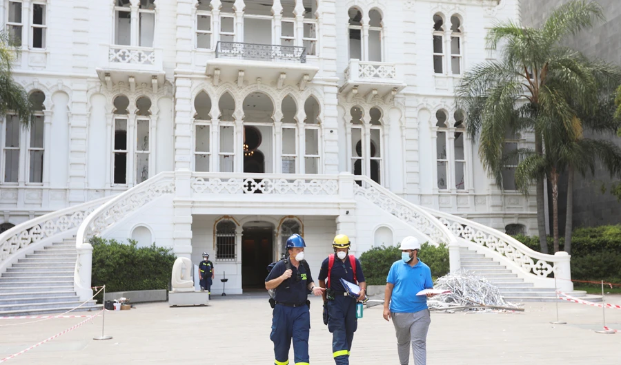 A team from the German Federal Agency for Technical Relief, assist Lebanese engineers in assessing building structure safety of Sursock Museum, following Tuesday's blast, in Beirut, Lebanon August 10, 2020. (REUTERS)