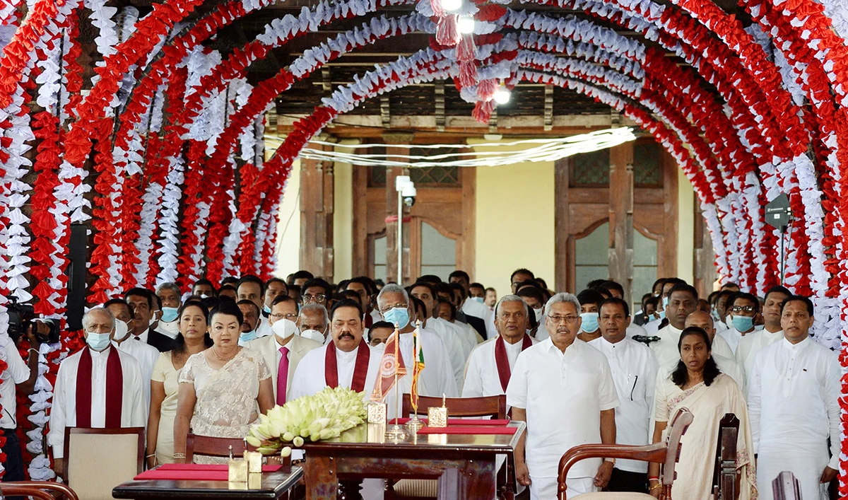 Sri Lanka’s President Gotabaya Rajapaksa, front row right, and Prime Minister Mahinda Rajapaksa, front row center, at the Cabinet swearing-in ceremony. (AFP)