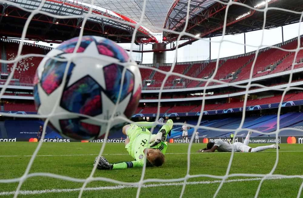 Bayern Munich's David Alaba scores an own goal and the first goal for Barcelona as Manuel Neuer attempts a save. (Manu Fernandez/Pool via REUTERS_