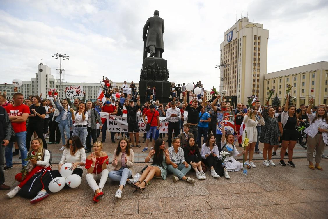 People gather at Independent Square during a rally in the center of Minsk, Belarus, Friday, Aug. 14, 2020. Some thousands of people have gathered in the centre of the Belarus capital, Minsk, in a show of anger over a recent brutal police crackdown on peaceful protesters that followed a disputed presidential election. (AP)